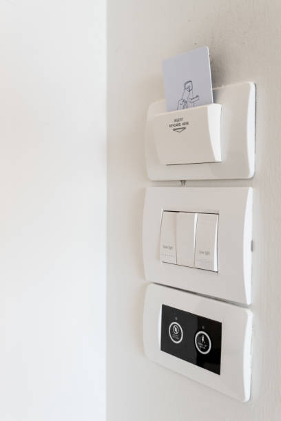 istock Electronic Keycard holder insert in hotel room. 1262619424