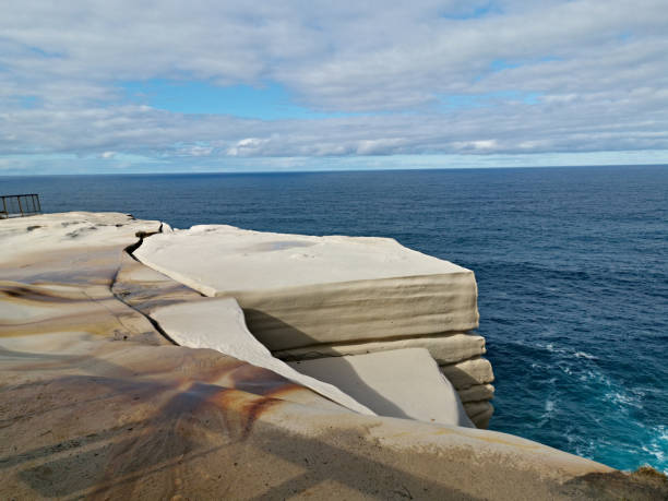 Beautiful coalstal trail with stunning rock formations and cliffs along the ocean front in the national park