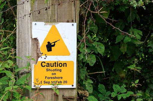 Caution shooting on Foreshore sign