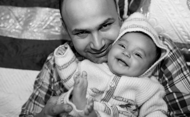 istock Happy father with her baby daughter 1262621211