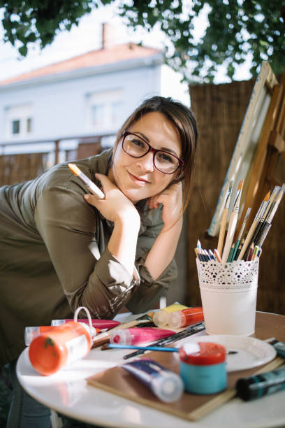 istock Girl looking at camera while posing in outdoor studio 1262623210
