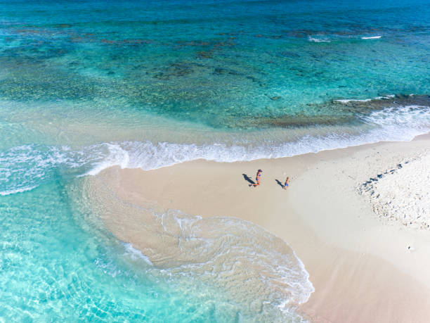 aerial view of mother and child on sandy spit, british virgin islands - sandbar imagens e fotografias de stock