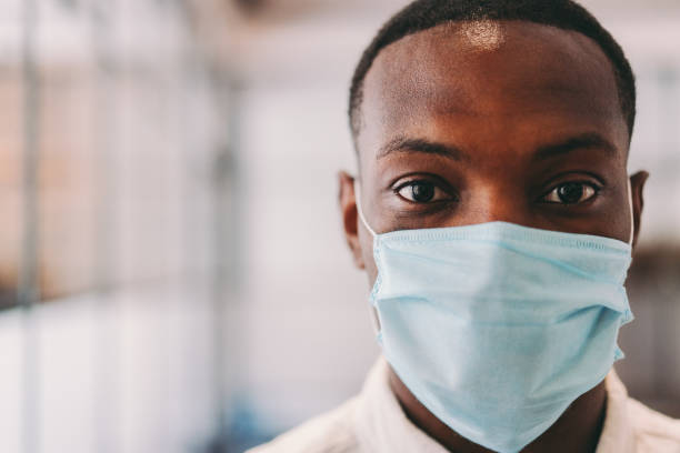 istock Man wearing protective face mask during COVID-19 pandemic 1262628864