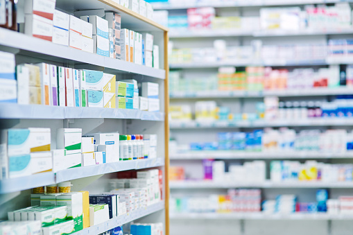 Shot of shelves stocked with various medicinal products in a pharmacy