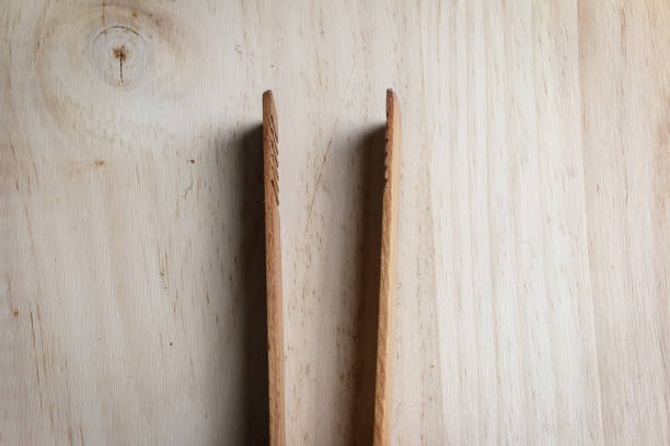 istock Wooden kitchen tongs 1262631373