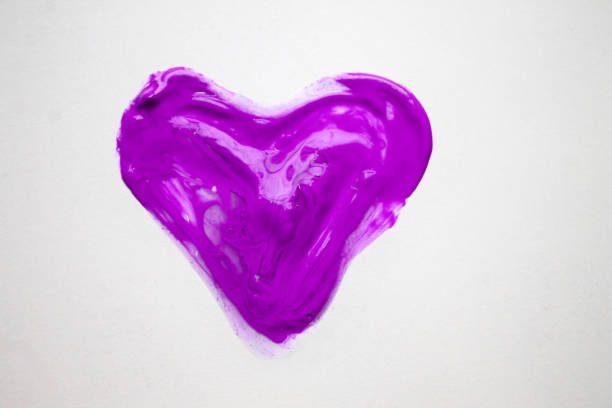 istock Purple heart paint on white background 1262634779