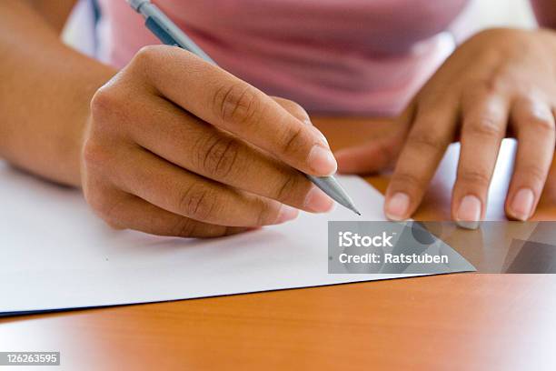 Closeup Of Adult Hands Writing With Pen And Paper Stock Photo - Download Image Now - Letter - Document, Handwriting, Writing - Activity