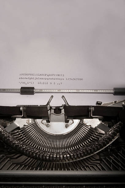 пишущая машинка - typewriter writing the end paper стоковые фото и изображения