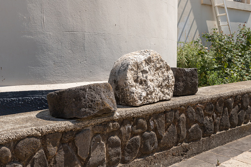 Tiberias, Israel, July 18, 2020 : The remains of the columns stand in the courtyard of the Church of the Apostles located on the shores of the Sea of Galilee, not far from Tiberias city in northern Israel