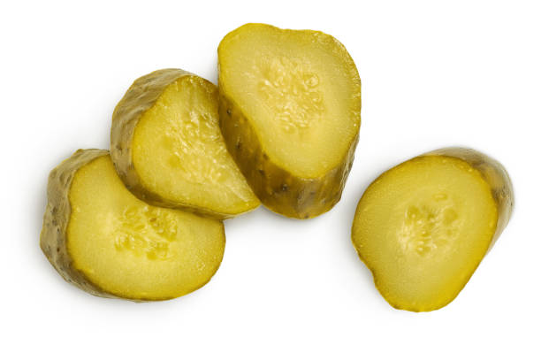 istock Marinated pickled cucumber slices isolated on white background with clipping path and full depth of field. Top view. Flat lay 1262655585