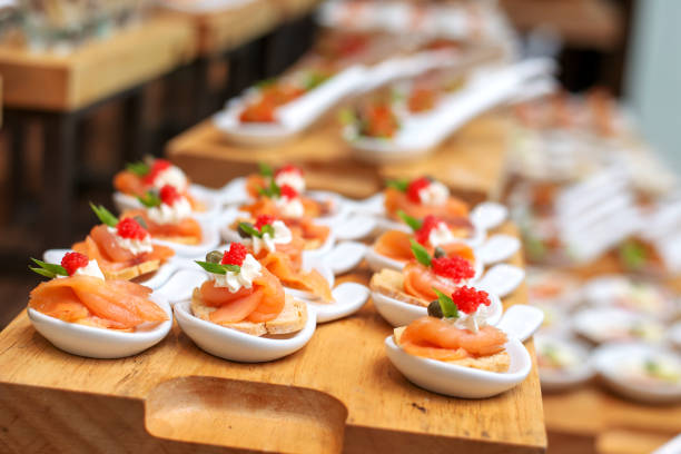 istock Cracker salmon caviar canape selection on wooden slate platter 1262656463