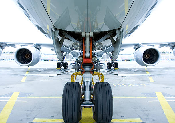 istock Landing gear shown in use under airplane  126265875