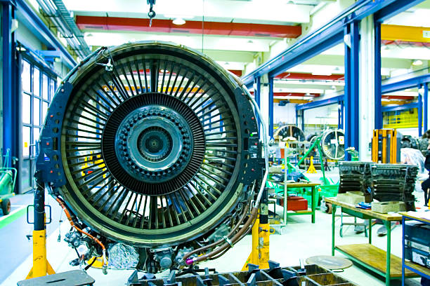 Jet Engine in Maintenance Hangar. Full overhaul of Jet Turbine stock photo