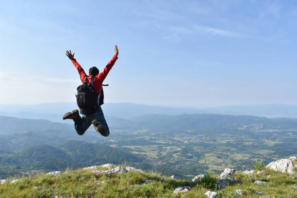 istock Man hiking in the mountains on a summer day 1262661528