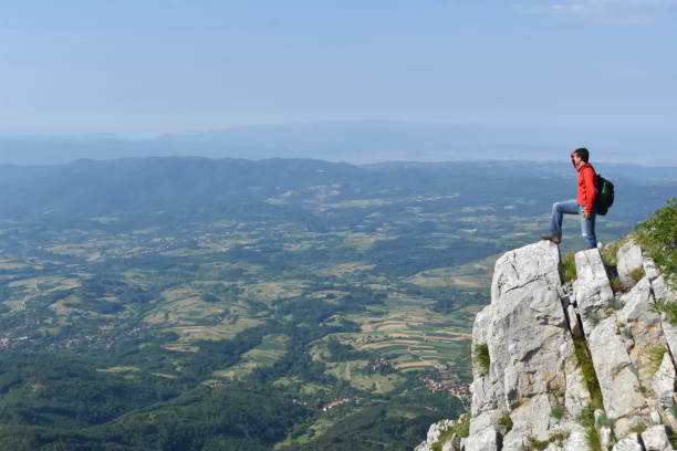 istock Man hiking in the mountains on a summer day 1262661826