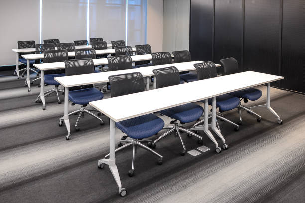 istock In order chairs and tables prepared for seminar 1262663877