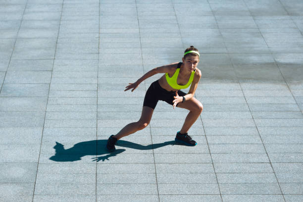 istock Female runner, athlete training outdoors in summer's sunny day. 1262669068