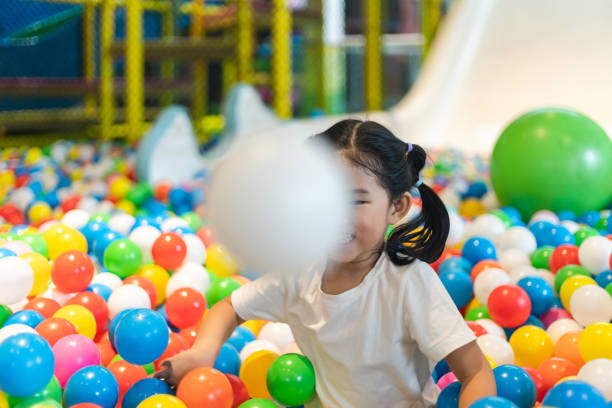 istock Cute girl at the Ball Pool 1262670416