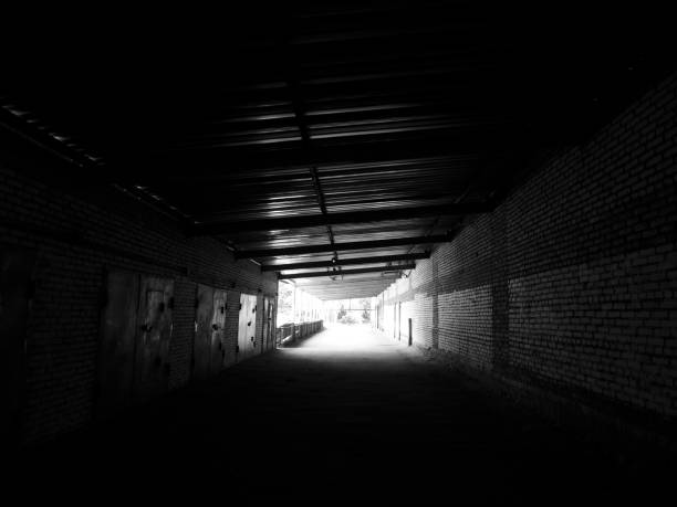 Light doorway in the end of dark corridor