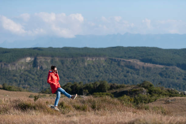 Woman in the outdoors using a smart phone