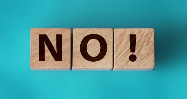 istock Word SCAM. Wooden small cubes with letters isolated on black background with copy space available. Concept image. 1262673000