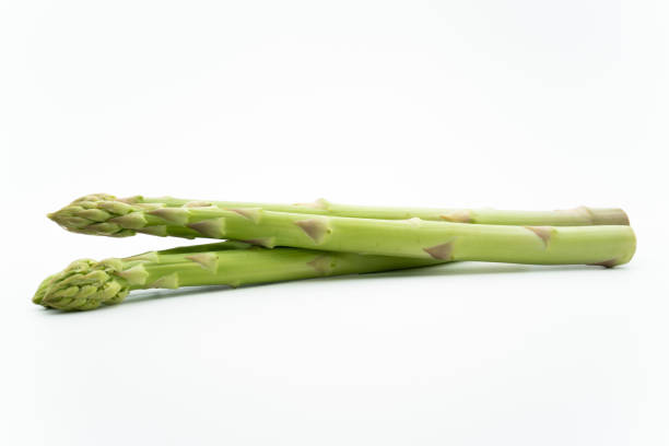 istock Green asparagus on a white background 1262674286
