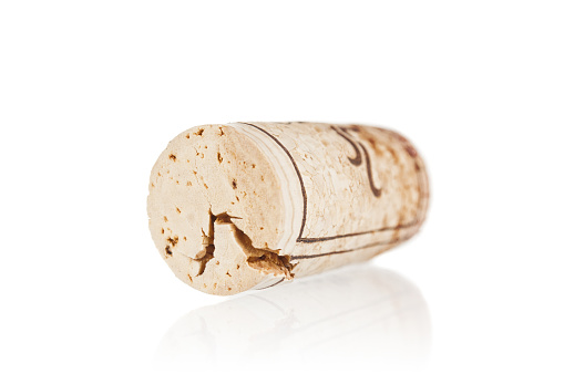 Wine cork close up isolated on white background