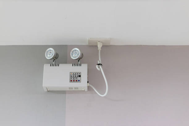 istock Emergency lights with two lamps.emergency light auto lighting working when power outage by battery. 1262683531