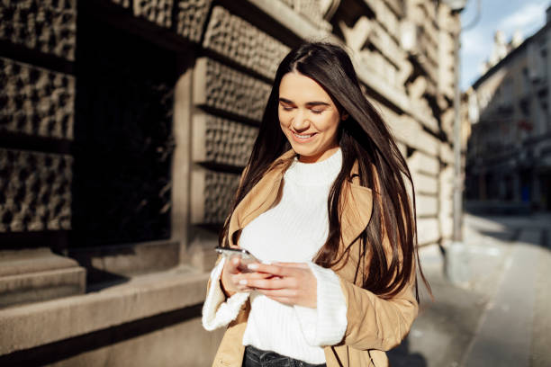istock Happy Caucasian woman using a smart phone 1262685641