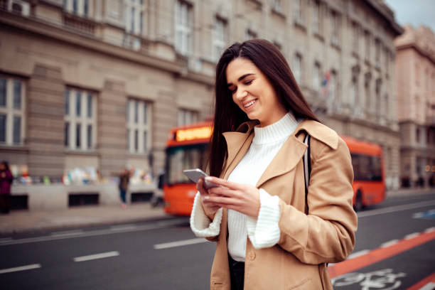 istock Happy Caucasian woman using a smart phone 1262686225