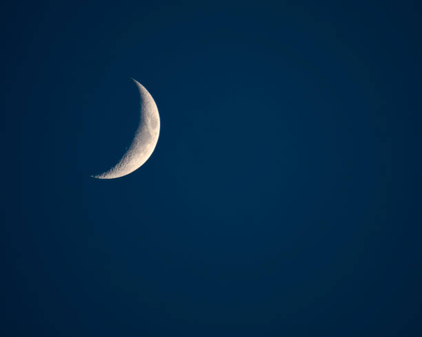 Waxing Crescent Moon over North Carolina Telephoto view of the waxing crescent moon with the Sea of Tranquility (Mare Tranquillitatis) visible. crescent photos stock pictures, royalty-free photos & images