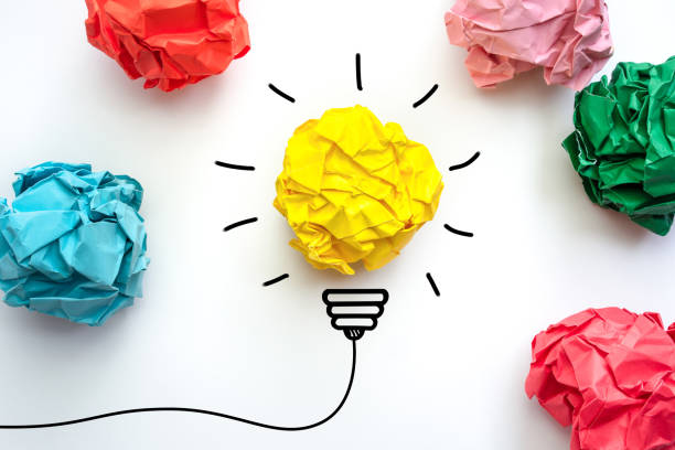 istock Creative idea. Concept idea and innovation with paper light bulb. 1262687795