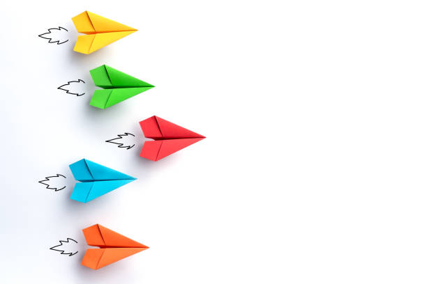 Paper planes on white background. Business competition concept. Paper planes on white background. Business competition concept. paper airplane photos stock pictures, royalty-free photos & images