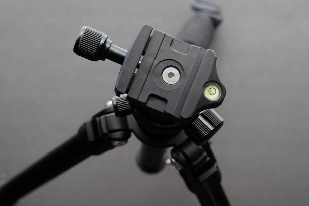 istock Tripod ball head close-up on dark background. 1262698693