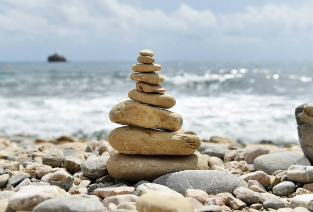 istock a tower of stones on the beach 1262702991