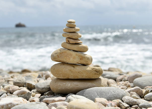 istock Tower of stones on the beach 1262703227