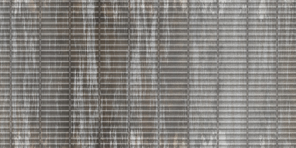 Dirty gary crimp fence background. Ribbed metallic surface. Wavy iron wall pattern. Fluted metal fencing backdrop. Corrugated metal texture.