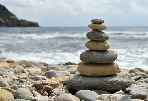 istock Tower of stones on the beach 1262703269