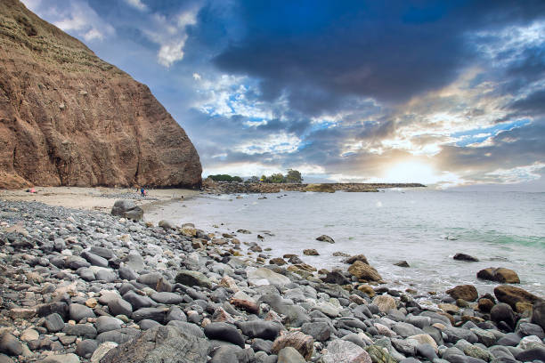 istock Dana Point rocky beach in California during sunrise 1262703885