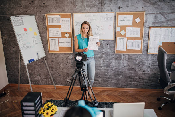 istock Female teacher is recording classes on a digital camera 1262707481
