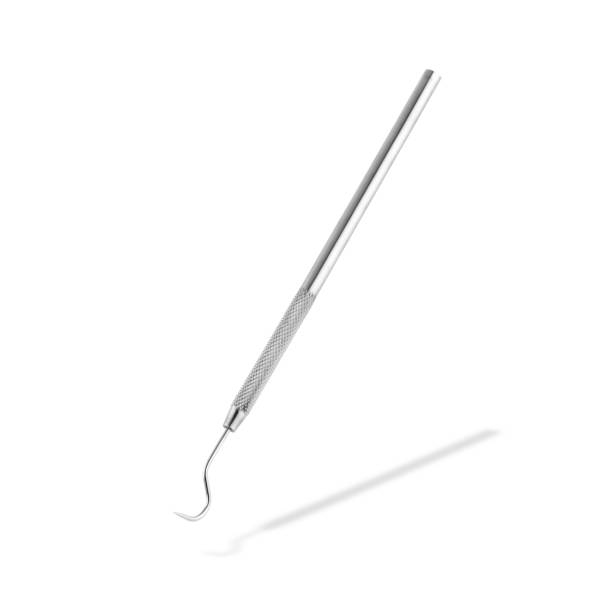 istock Dentist's sickle probe dental explorer on white with drop shadow with clipping path 1262721428