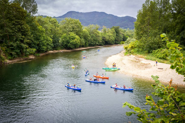 Some people canoeing down the Rio Sella in Asturias, Spain stock photo