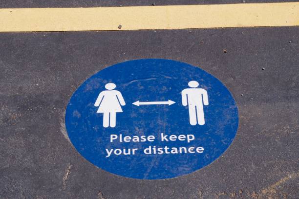 istock Covid 19 related Keep your distance markings on the ground 1262724974