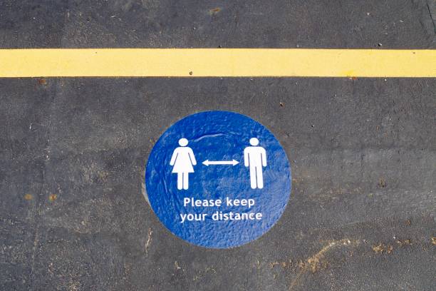istock Covid 19 related Keep your distance markings on the ground 1262726021