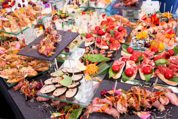 istock Assortment festive appetizers on the plate, selective focus. Festive buffet 1262727931