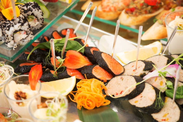 istock Assortment festive appetizers on the plate, selective focus. Festive buffet 1262729309
