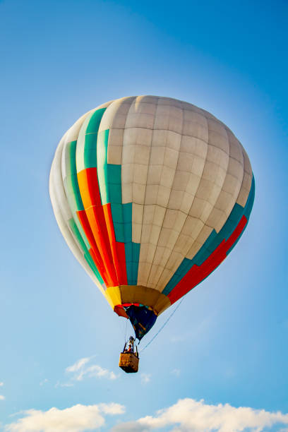 istock Colored hot air balloons in the sky 1262733719