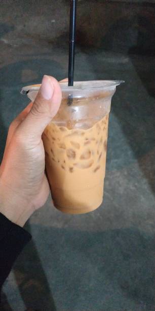 istock Thai tea take hand beauty 1262733860