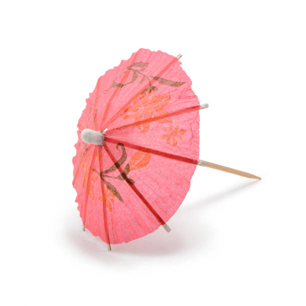 istock Pink paper umbrella isolated on white background 1262734011
