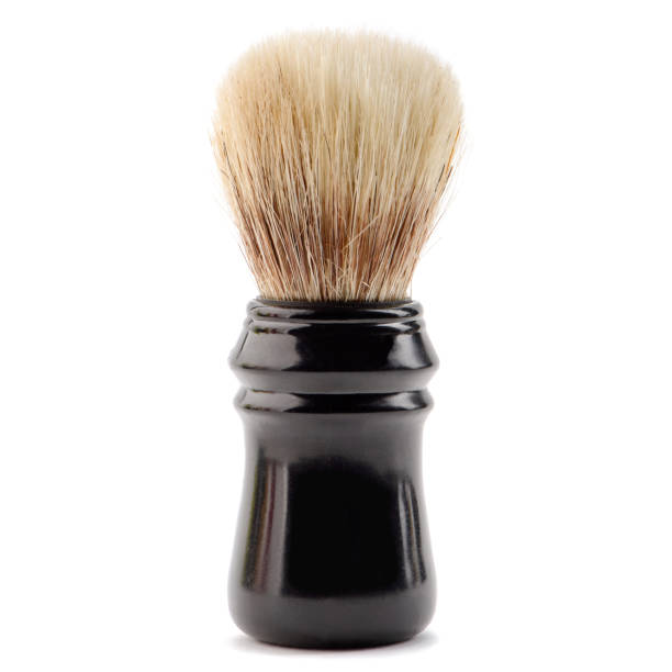 Shaving brush on white background. Barber shop equipment and traditional design.
